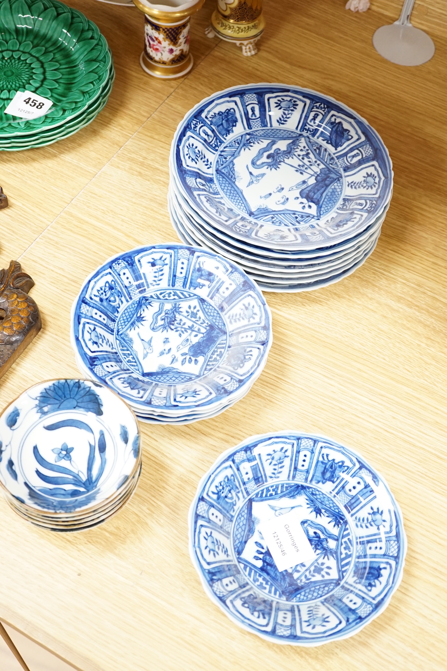 A group of Chinese blue and white dishes and plates and a damaged vase, 30cm